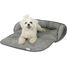 Hund liegt in einem grauen Hundebett von Kerbl