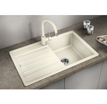 Beige Küchenspüle mit Abtropffläche und passender Armatur