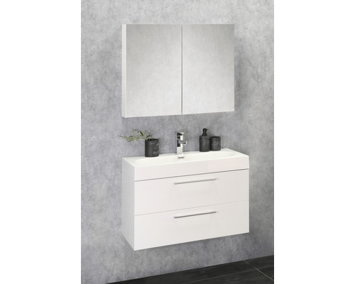 Salle de bains avec meuble sous-lavabo blanc, vasque à poser et armoire de toilette