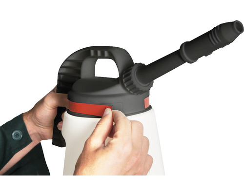 Drucksprüher mit Hand und rotem Band