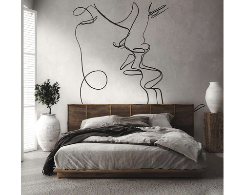 Chambre à coucher avec lit, sticker mural et décoration