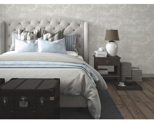 Scène de chambre à coucher avec lit, table de chevet et objets de décoration pour une ambiance chaleureuse