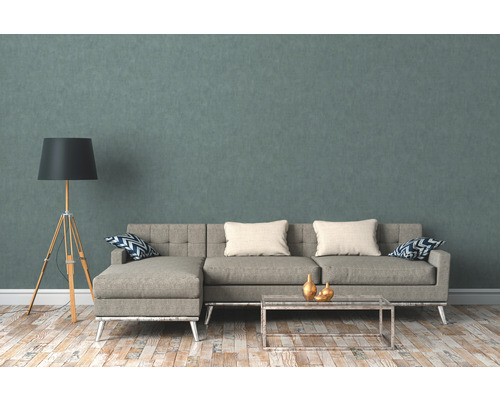 Salon avec canapé d''angle, lampadaire et table basse