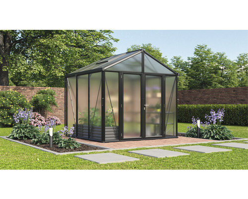 Serre de jardin avec plantes et fleurs