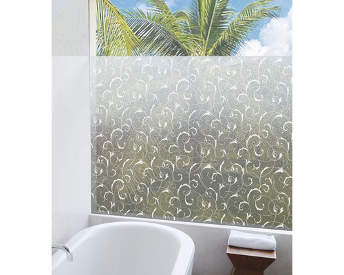 Fenêtre de salle de bains avec film décoratif pour fenêtre à motif de plantes.
