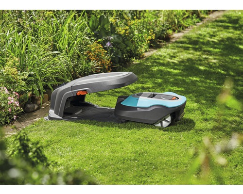 Station de charge pour robot tondeuse Gardena sur pelouse