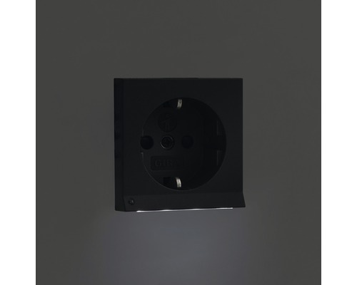 Schwarze Steckdose zur Stromversorgung