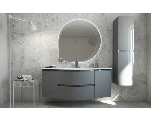 Salle de bains moderne avec meuble sous-lavabo, armoire de toilette et miroir rond avec éclairage.