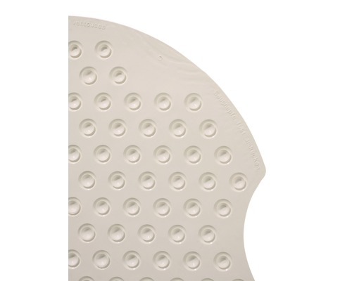 Découpe d''un tapis de bain avec ventouses