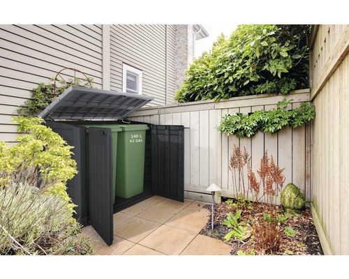 Mülltonnenbox mit einer 240 Liter Mülltonne im Garten