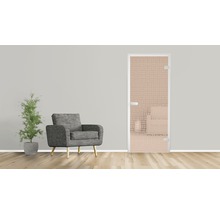 Scène avec un fauteuil, une plante et une porte intérieure design en verre.
