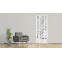 Porte intérieure décorative avec motif géométrique, fauteuil et plante d''intérieur dans un espace de vie.