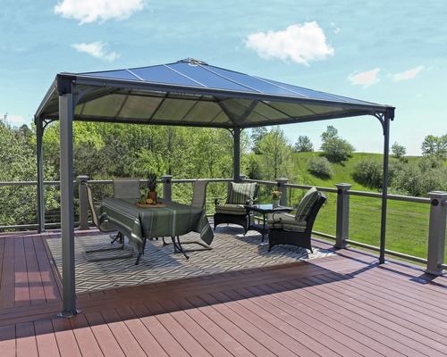 Pavillon autoportant avec table et chaises sur une terrasse