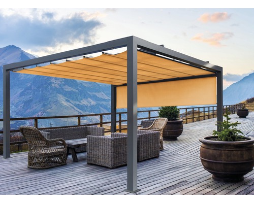 Pergola avec toit en tissu et coin salon sur une terrasse avec vue sur la montagne.