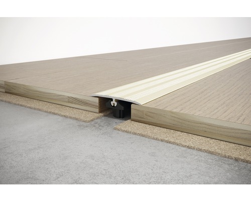 Profilé de sol en aluminium entre deux planchers en bois