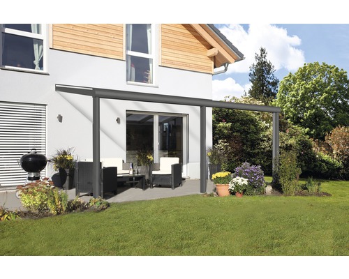 Pergola de terrasse en aluminium avec mobilier de jardin