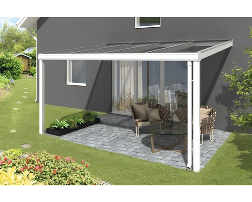 Toiture pour terrasse SKAN HOLZ Modena 434x257 cm, blanc Pergola de terrasse avec coin salon et plantations dans le jardin.