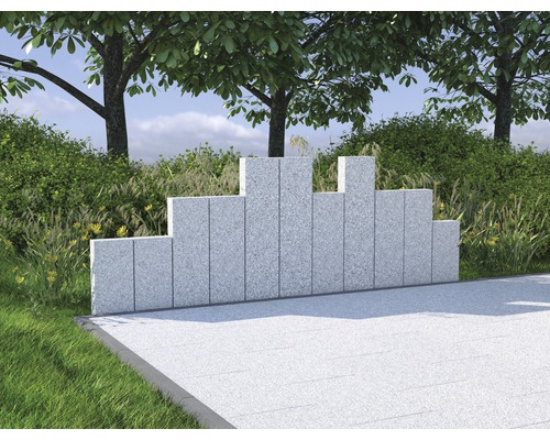 Gartenansicht mit Windschutzwand aus Stein