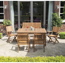 Ensemble de mobilier de jardin avec table, chaises et banc sur une terrasse
