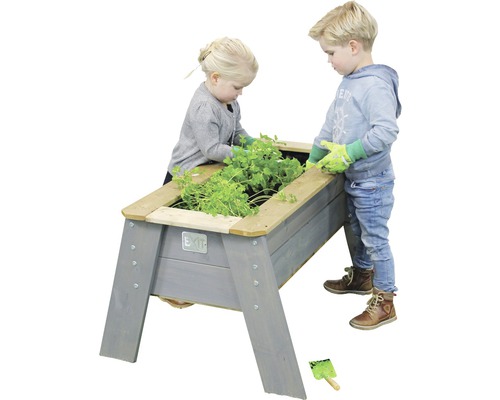 Hochbeet für Kinder mit Pflanzen und zwei Kindern