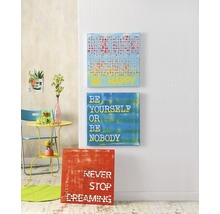Tableaux décoratifs sur toile avec motif et dictons sur un mur