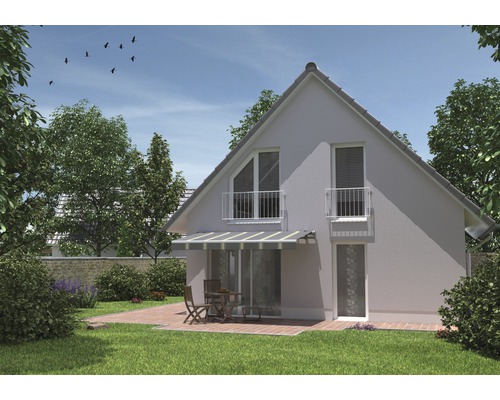 Maison avec terrasse et mobilier de jardin