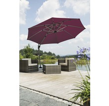 Scène avec salon de jardin sous un parasol