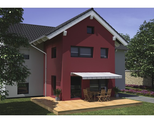Vue d''une maison avec un store au-dessus d''une terrasse avec des meubles de jardin