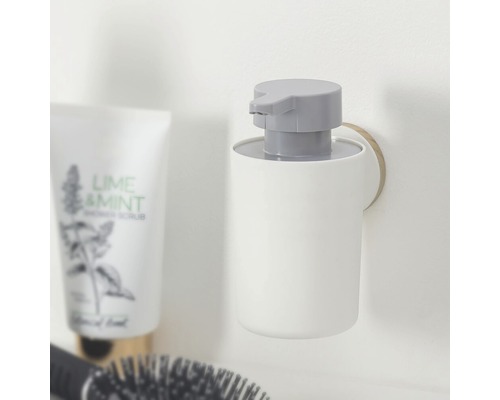 Distributeur de savon mural pour utilisation dans la salle de bain