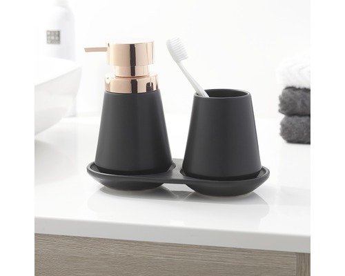 Seifenspender mit Zahnputzbecher auf Ablage