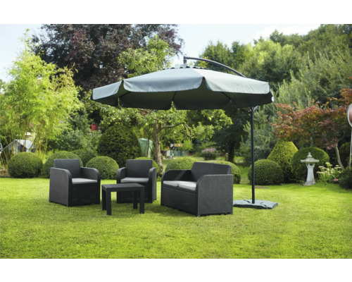 Ensemble de mobilier de jardin avec parasol sur pelouse