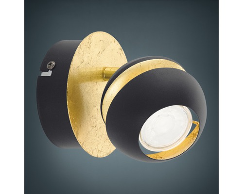 Applique murale pivotante de forme ronde avec ornement de couleur dorée