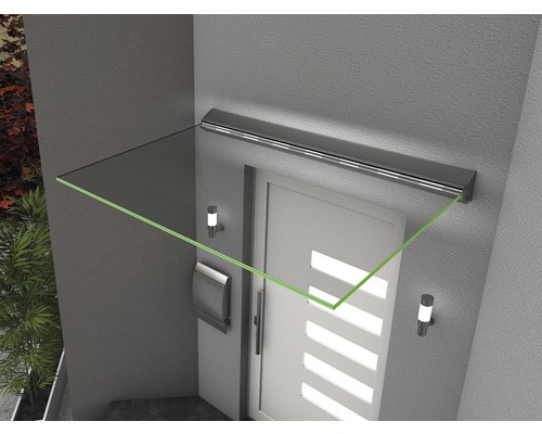 Vordach aus Glas über einer Haustür mit Briefkasten und Außenleuchten