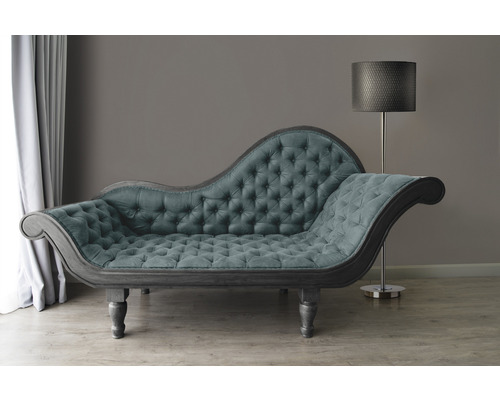 Chaiselongue mit Knopfheftung und Stehlampe