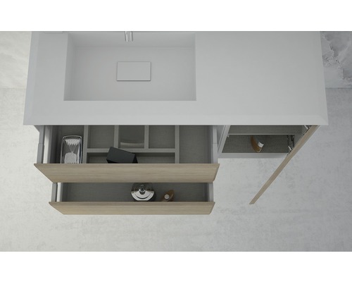 Vue détaillée d''un meuble sous-lavabo avec des tiroirs ouverts pour ranger les accessoires de salle de bain