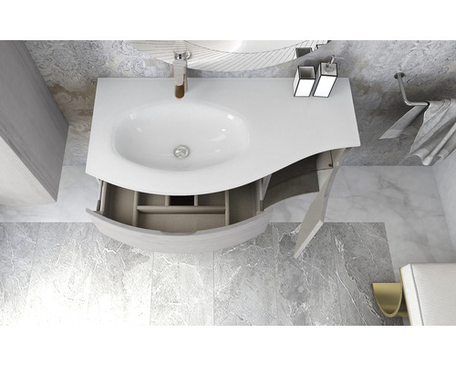 Meuble de salle de bains avec tiroir ouvert, lavabo et robinetterie.