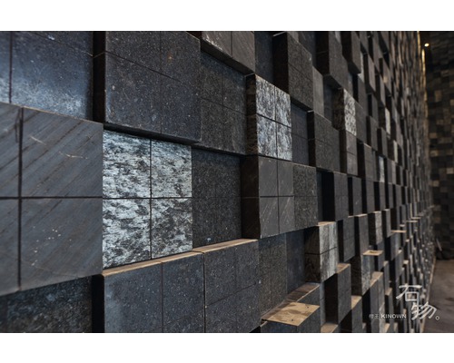 Aménagement mural avec des éléments carrés en pierre naturelle en aspect 3D