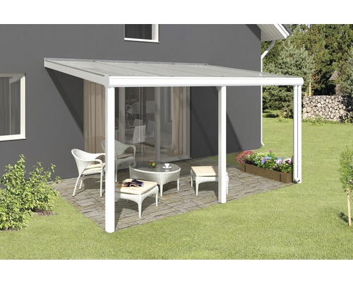 Auvent de terrasse avec mobilier de jardin sur la terrasse
