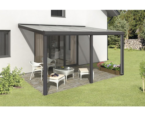 Auvent de terrasse avec mobilier de jardin sur la terrasse