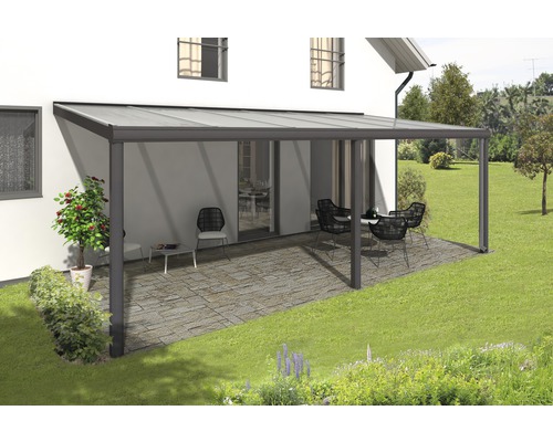 Toit de terrasse en aluminium avec meubles sur la terrasse