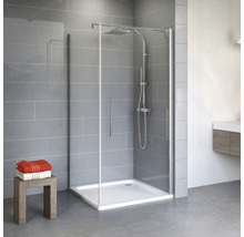 Cabine de douche avec receveur dans une salle de bain lumineuse