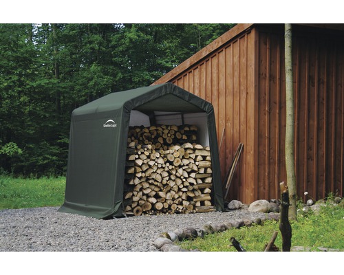 Gerätehaus ShelterLogic Shed-in-a-Box 240 x 240 cm grün Holzlager mit ShelterLogic Logo und Holzstapel