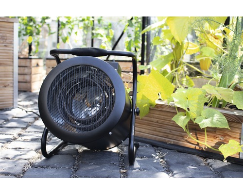 Gewächshausheizung, Elektroheizung Vitavia Antares 3 kW rund Heizlüfter für Gewächshäuser neben Pflanzen