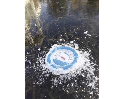 Thermometer auf einer Eisfläche