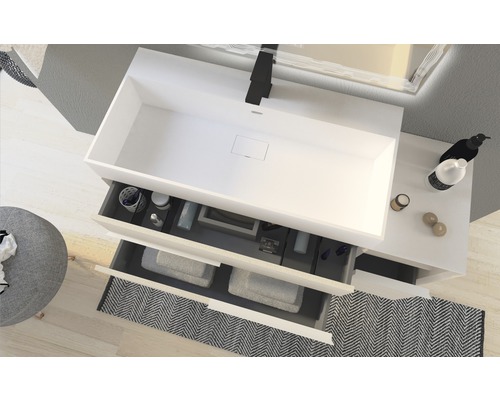 Meuble sous-lavabo avec système de tiroirs ouverts et lavabo rectangulaire