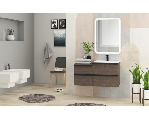 Salle de bain moderne avec meuble-lavabo, miroir, bidet et décoration