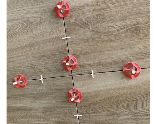 Carrelage avec système de nivellement et croisillons