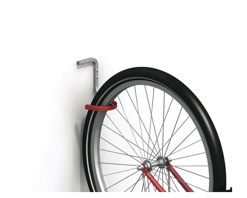Support à vélos sur un mur avec un pneu de vélo