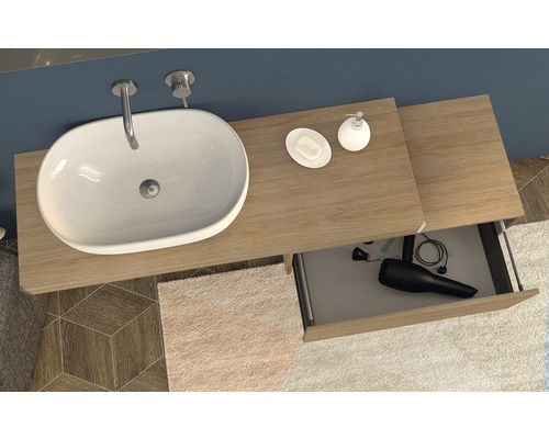 Vue de dessus d''une salle de bains avec lavabo, savon, distributeur de savon et tiroir ouvert