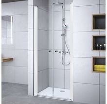 Cabine de douche avec porte en verre transparent dans la salle de bain.